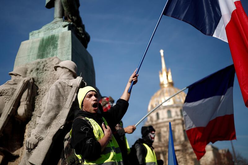 Protesters wearing yellow vests take part in a demonstration of the "yellow vests" movement in Paris, France, February 16, 2019. REUTERS/Benoit Tessier