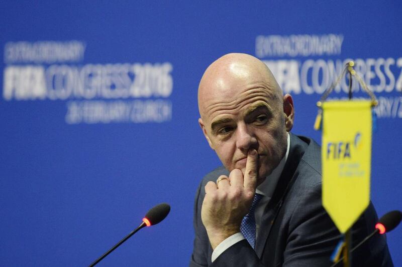 New Fifa president Gianni Infantino gestures during his first news conference following his election in Zurich on February 26, 2016.  AFP PHOTO / OLIVIER MORIN

