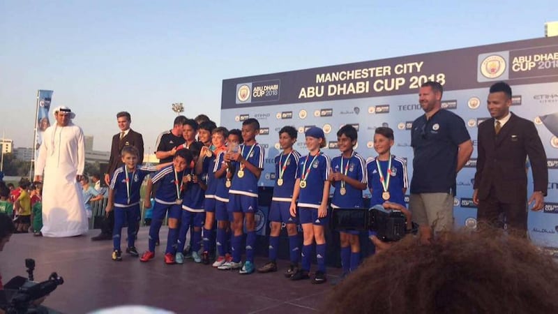 Former Man City player Lee Crooks with his youth academy at the Man City Abu Dhabi Cup.