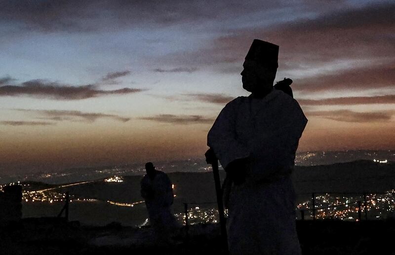 A Samaritan worshipper takes part in a Passover ceremony on top of Mount Gerizim, near the northern West Bank town of Nablus. AFP