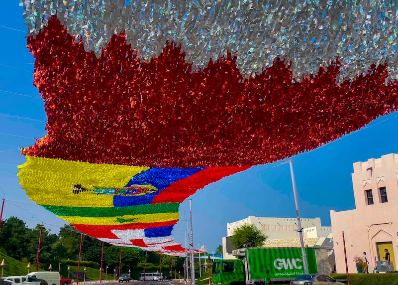 Katara Cultural Village street is decorated with the national flags of the participating nations of the Fifa World Cup at Katara in Doha. EPA