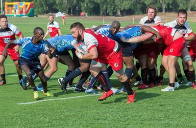 Ras Al Khaimah, United Arab Emirates -  RAK Rugby  (red) vs Dubai Sharks (blue) game at Al Hambra Golf Club.  Ruel Pableo for The National