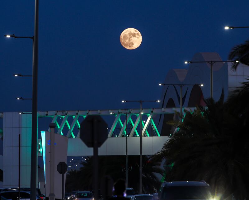 The supermoon seen over Abu Dhabi’s Al Qana area throws stunning light on the capital. Victor Besa / The National