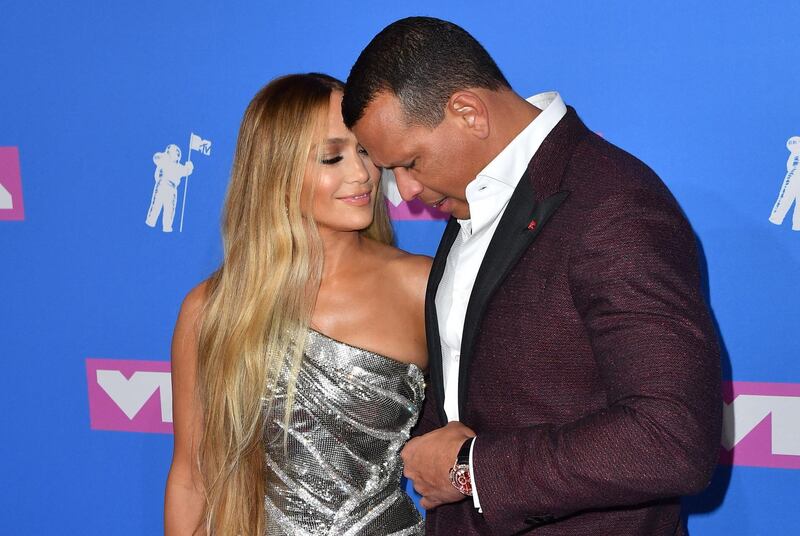 (FILES) In this file photo taken on August 20, 2018 US singer Jennifer Lopez (L) and former US baseball player Alex Rodriguez attend the 2018 MTV Video Music Awards at Radio City Music Hall in New York City.  Singer Jennifer Lopez and former New York Yankees baseball star Alex Rodriguez said Saturday, March 13, they were "working through some things", but called reports they had broken up "inaccurate". / AFP / ANGELA WEISS
