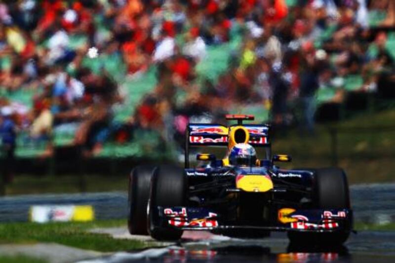 BUDAPEST, HUNGARY - JULY 30:  Sebastian Vettel of Germany and Red Bull Racing drives during the final practice session prior to qualifying for the Hungarian Formula One Grand Prix at the Hungaroring on July 30, 2011 in Budapest, Hungary.  (Photo by Vladimir Rys/Getty Images) *** Local Caption ***  120091793.jpg