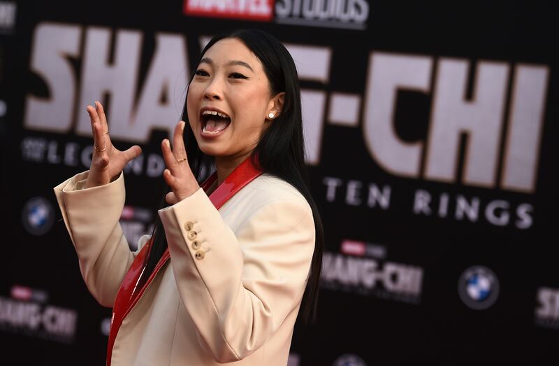 Cast member Awkwafina arrives at the premiere.