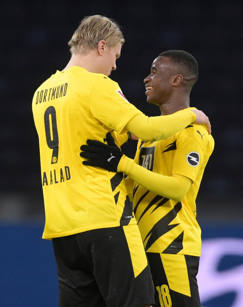 Dortmund's Erling Braut Haaland and Youssoufa Moukoko after the game. AP