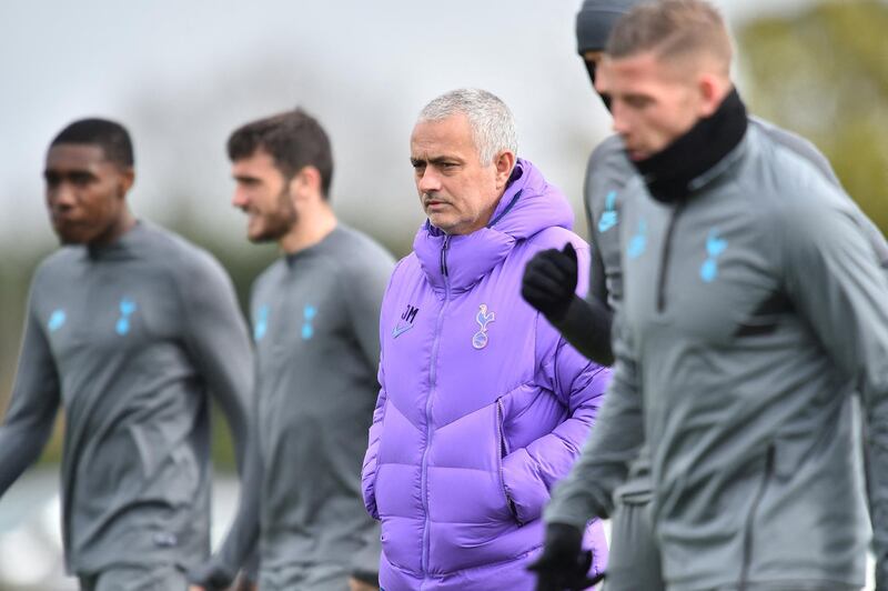 Tottenham Hotspur's Portuguese head coach Jose Mourinho (C) attends a team training session at Tottenham Hotspur's Enfield Training Centre, in north London on March 9, 2020, ahead of their UEFA Champions League Last 16 second-leg football match against RB Leipzig. (Photo by Glyn KIRK / AFP)