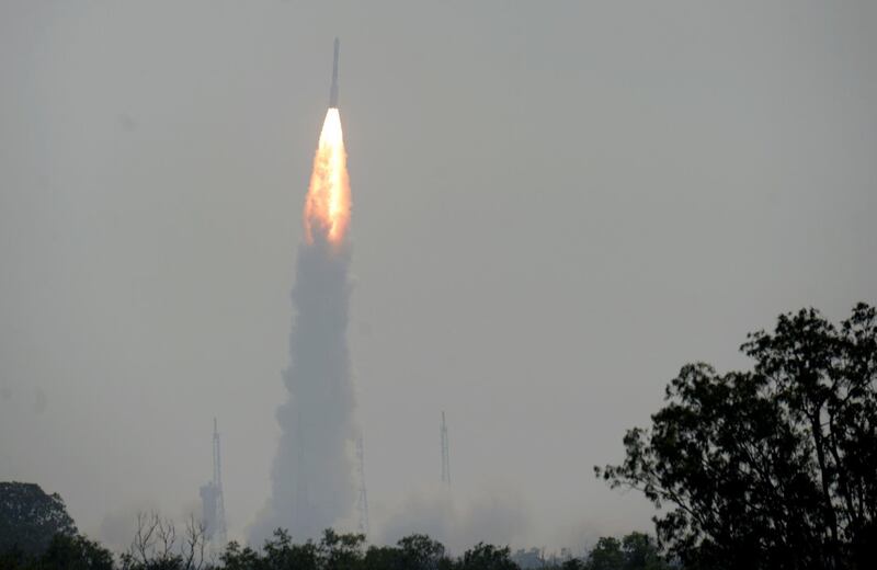 The Indian Space Research Organisation's (ISRO) Polar Satellite Launch Vehicle (PSLV-C45) launches India's Electromagnetic Spectrum Measurement satellite 'EMISAT' -- along with 28 satellites from other countries including Lithuania, Spain, Switzerland and the US -- at the Satish Dhawan Space Centre in Sriharikota, in Andhra Pradesh state, on April 1, 2019. / AFP / ARUN SANKAR
