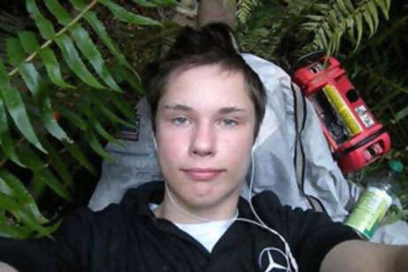 This undated image shows Colton Harris-Moore, aka the "Barefoot Bandit," using a stolen camera that was later recovered by deputies.