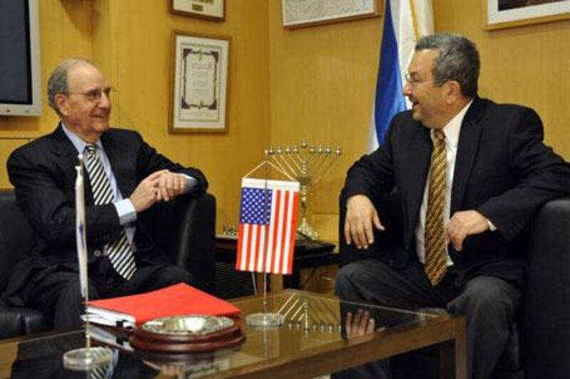 US special Middle East envoy, George Mitchell, left, with Israeli defence minister Ehud Barak in Tel Aviv.