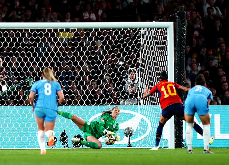 England goalkeeper Mary Earps saves a penalty from Spain's Jennifer Hermoso. PA 