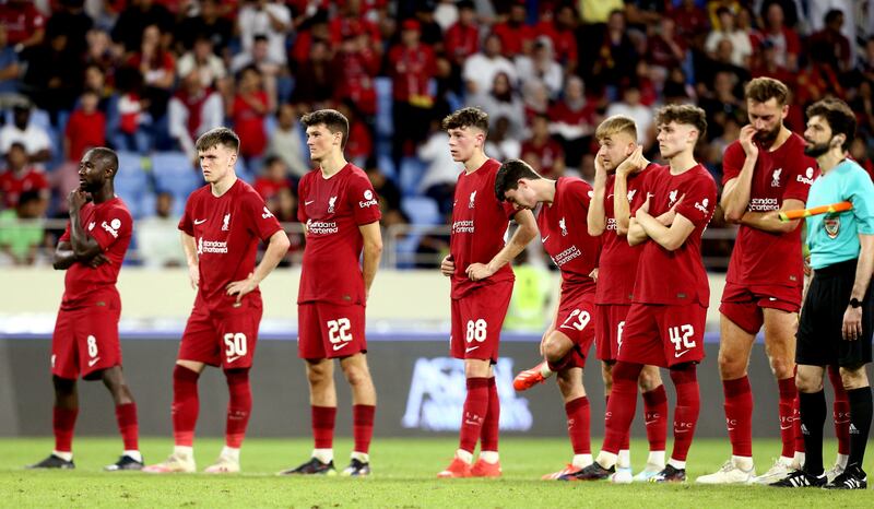 Liverpool players during the penalty shoot out. Reuters