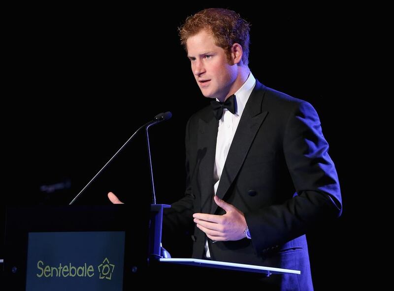 Britain’s Prince Harry gives a speech at the Sentebale 'Forget Me Not' dinner in Dubai. Chris Jackson / Getty Images