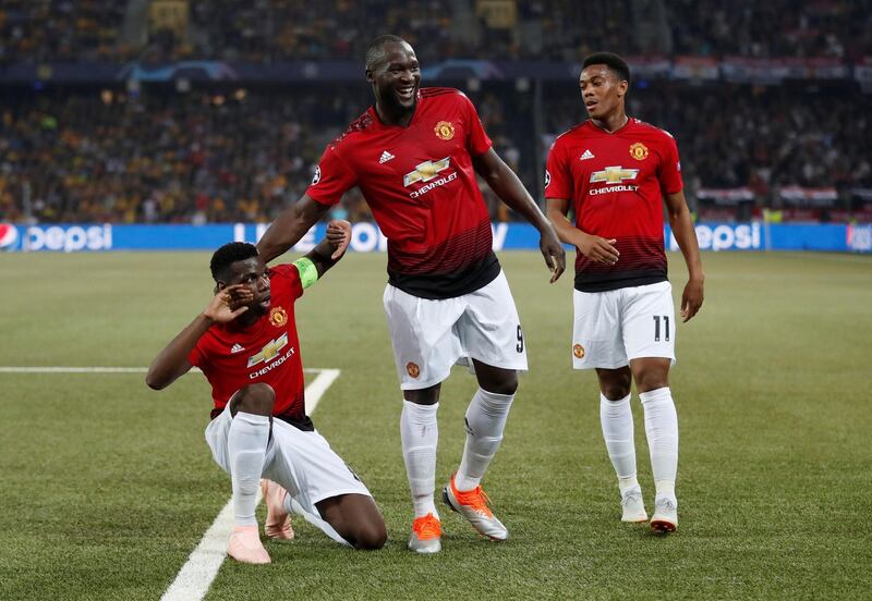 Pogba celebrates with Romelu Lukaku and Anthony Martial after scoring United's first goal. Action Images via Reuters