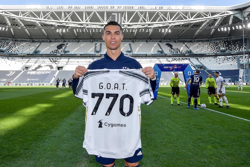 TURIN, ITALY - MARCH 21: Cristiano Ronaldo of Juventus with a special shirt, created to celebrate 770 goals scored in his career prior to the Serie A match between Juventus and Benevento Calcio at Allianz Stadium on March 21, 2021 in Turin, Italy. (Photo by Daniele Badolato - Juventus FC/Juventus FC via Getty Images)