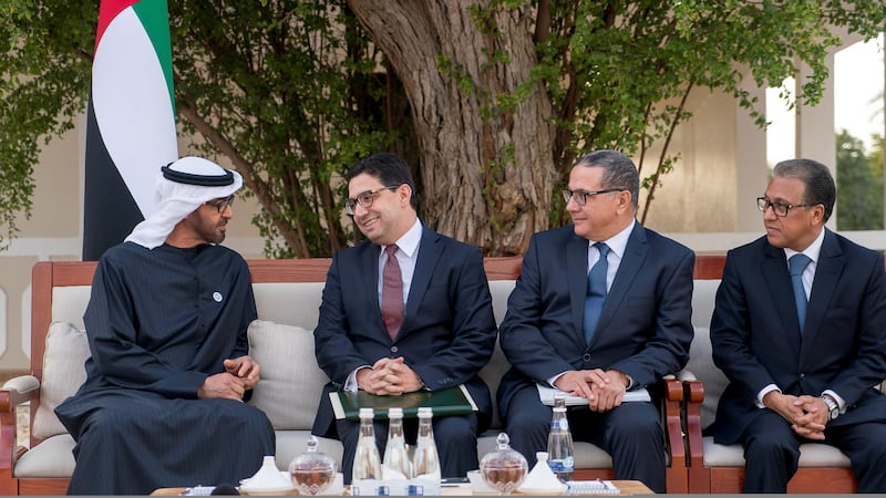 AL AIN, ABU DHABI, UNITED ARAB EMIRATES - 51, 08, 2018: HH Sheikh Mohamed bin Zayed Al Nahyan Crown Prince of Abu Dhabi and Deputy Supreme Commander of the UAE Armed Forces (L) receives HE Nasser Bourita, Minister of Foreign Affairs and International Cooperation of Morocco (2nd L), during a barza at Al Maqam Palace. Seen with Mohamed Boussaid, Minister of Economy and Finance of Morocco (3rd L) and HE Mohamed Ait Ali, Ambassador of Morocco to the UAE (4th L).

( Rashed Al Mansoori / Crown Prince Court - Abu Dhabi )
---