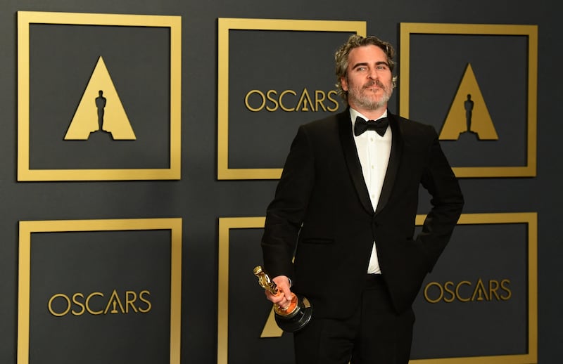 US actor Joaquin Phoenix in the press room with the Best Actor Oscar for 'Joker' during the 92nd Academy Awards at the Dolby Theatre in Hollywood on February 9, 2020. AFP