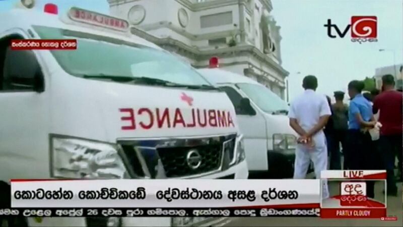 Ambulances wait outside St Anthony's Shrine. Derana TV/via Reuters