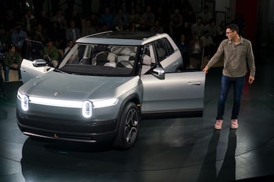 RJ Scaringe, chief executive and founder of Rivian Automotive, introducing the R3 prototype crossover electric vehicle in Laguna Beach, California. Bloomberg