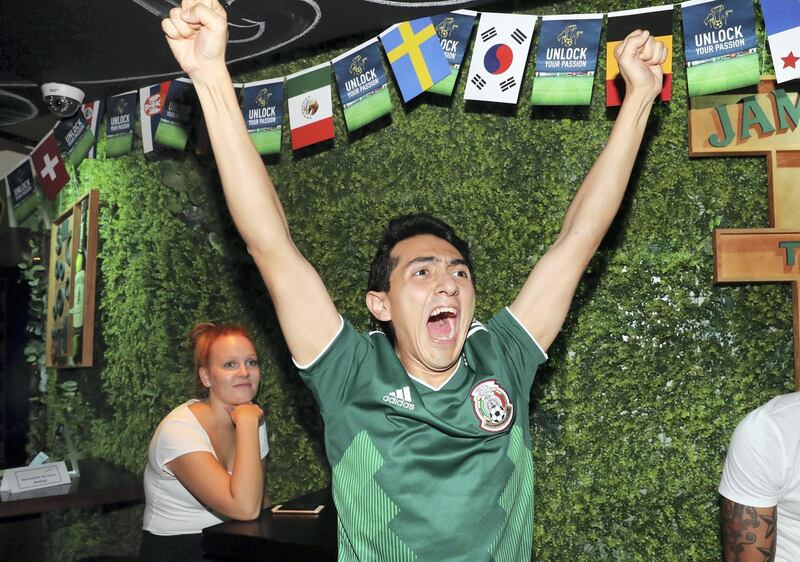 Dubai, United Arab Emirates - June 17th, 2018: Mexico fan Sebastian Medina celebrates Mexico's win during the game between Germany and Mexico. Sunday, June 17th, 2018 in Media One, Dubai. Chris Whiteoak / The National