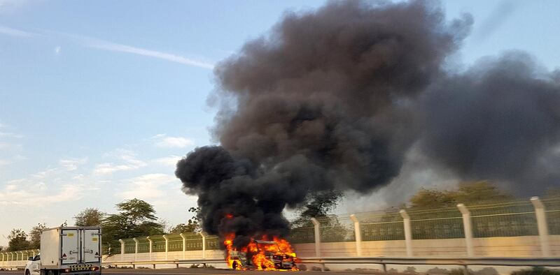 A car fire seen on the E11 road near Ghantoot, heading towards Abu Dhabi. 3 January 2019. The National