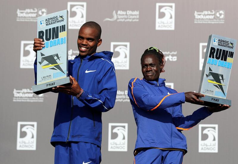 Abu Dhabi, United Arab Emirates - December 06, 2019: Thens mens and womens marathon winners Vivian Kiplagat and Reuben Kipyego at the ADNOC Abu Dhabi marathon 2019. Friday, December 6th, 2019. Abu Dhabi. Chris Whiteoak / The National