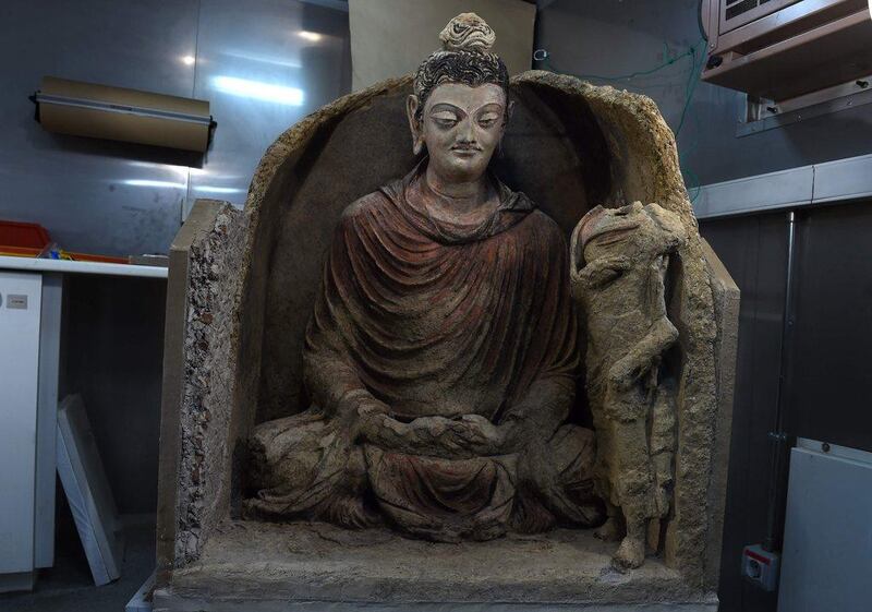 A statue of Buddha at the French archaeological delegation to Afghanistan office in Kabul. Having withstood time, the elements, looters and war, the spectacular Buddha was restored and removed from one of Afghanistan’s most dangerous regions. It will make its public debut in the country’s national museum. Wakil Kohsar / Agence France-Presse / March 14, 2017  