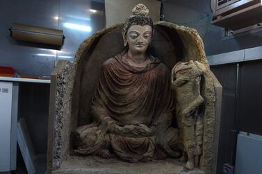A statue of Buddha at the French archaeological delegation to Afghanistan office in Kabul. Having withstood time, the elements, looters and war, the spectacular Buddha was restored and removed from one of Afghanistan’s most dangerous regions. It will make its public debut in the country’s national museum. Wakil Kohsar / Agence France-Presse / March 14, 2017  