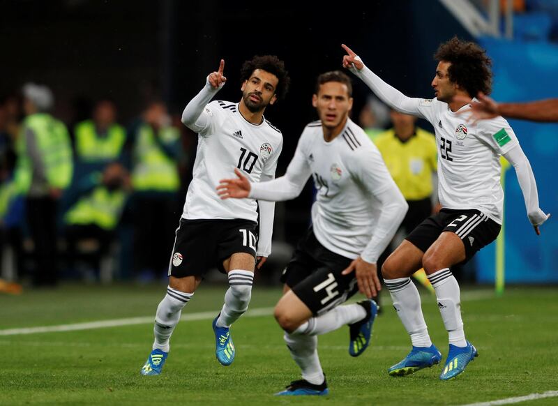 Mohamed Salah celebrates scoring Egypt's first goal with team mates. Lee Smith / Reuters