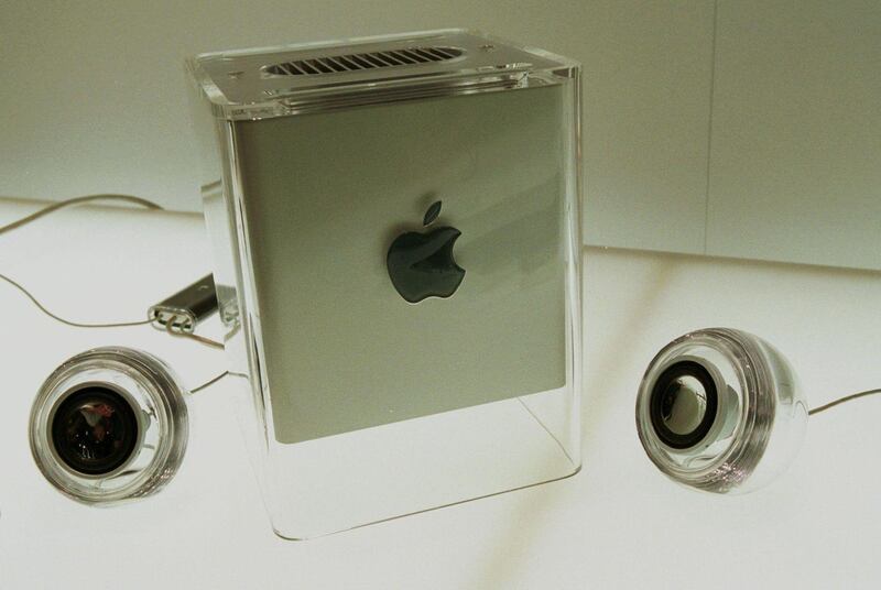 The new Power Mac G4 cube sits along with a pair of Apple designed Harman Kardon speakers at the Mac World Expo in New York, New York on July 19, 2000.  Photographer:  Rick Maiman.  Bloomberg News.