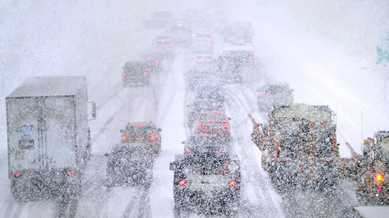 Brutal weather brings traffic to a virtual standstill in Londonderry, New Hampshire. AP