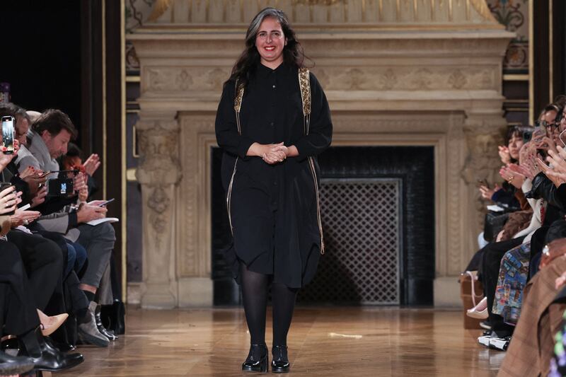 Moroccan fashion designer Sara Chraibi is applauded at the end. AFP