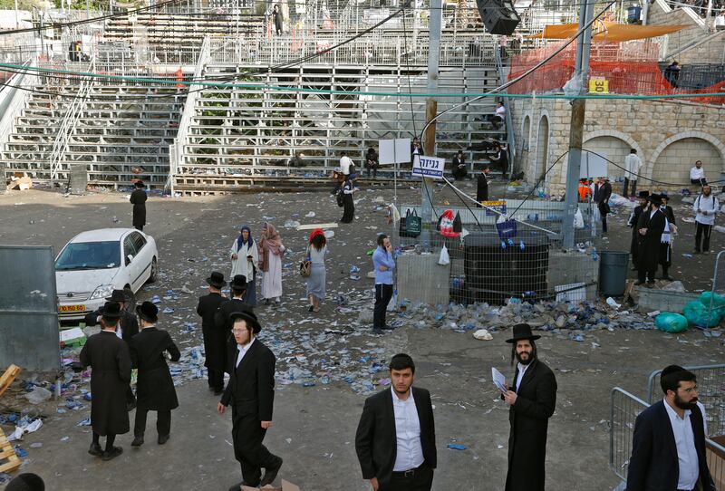 Orthodox Jewish men on April 30, 2021 at the scene of a stampede in which 45 people died near the reputed tomb of Rabbi Shimon bar Yochai. AFP