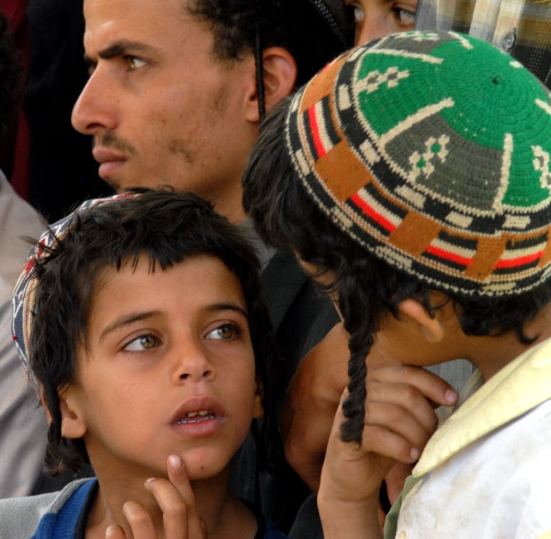 Members of the displaced Yemeni Jewish Marhabi at their temporary residence in the tourist city hotel compound in Sanaa on June 23, 2008.