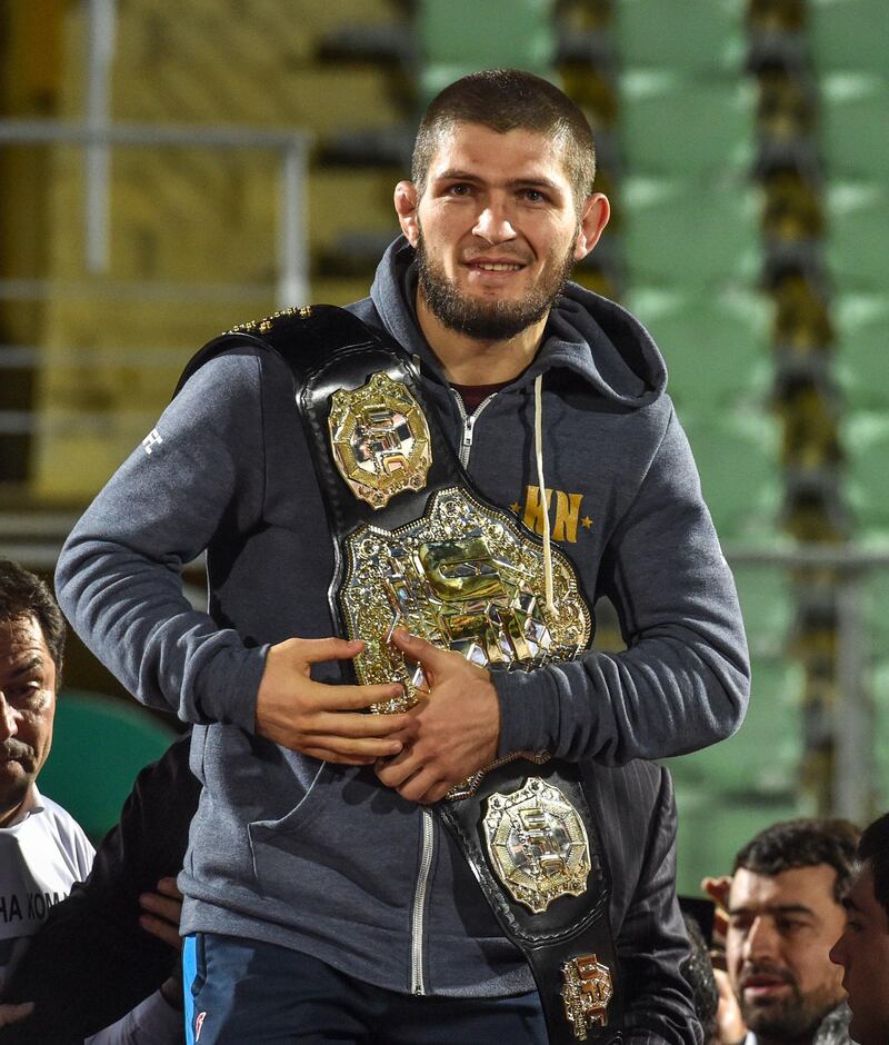 Khabib Nurmagomedov carries his UFC championship belt. AFP