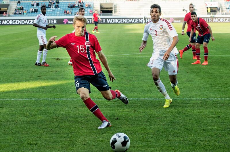 STAVANGER, NORWAY - AUGUST 27:  Martin Odegaard of Norway and W.Abbas of United Arab Emirates during the International  Friendly match between Norway and the United Arab Emirates at Viking Stadion  on Aug 27, 2014 in Stavanger, Norway. The 15 year old, Martin Odegaard, is Norway's youngest ever international. (Photo by Trond Tandberg/ Getty Images)