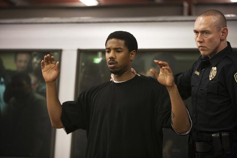 Michael B Jordan as Oscar Grant, left, and Kevin Durand in a scene from Fruitvale Station. Ron Koeberer / AP Photo/The Weinstein Company
