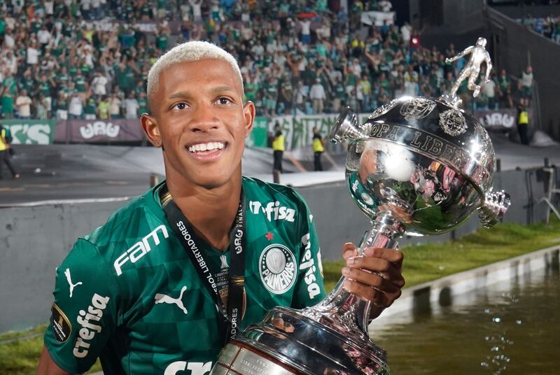 Palmeiras' Danilo celebrates winning the Copa Libertadores with the trophy. Reuters