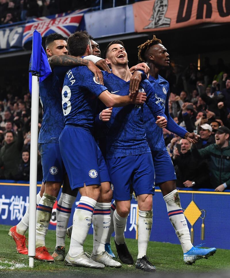 Jorginho (C) celebrates with teammates after the opening goal from the penalty spot. EPA