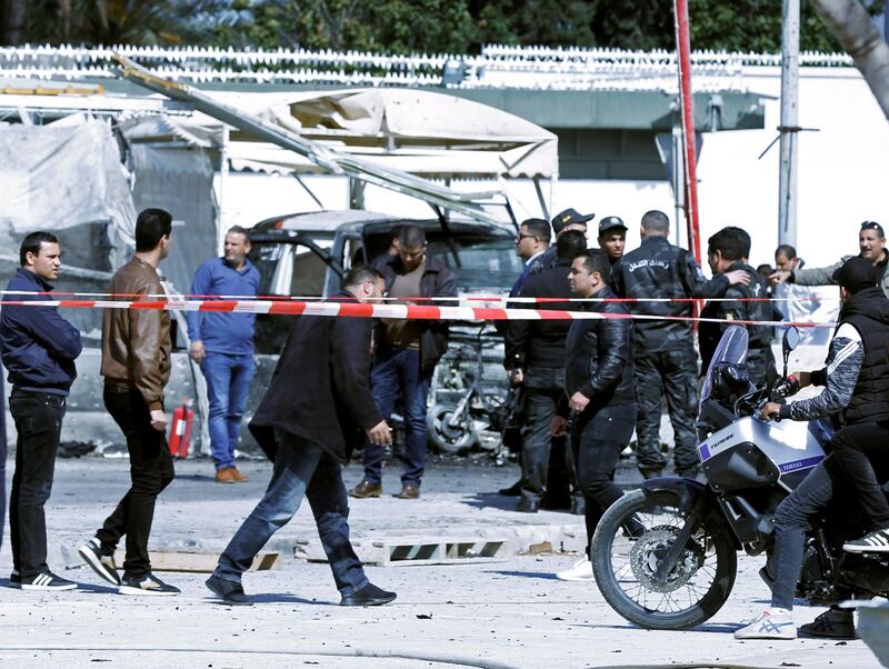 People gather at the site of a suicide attack near the US embassy in Tunis. Reuters