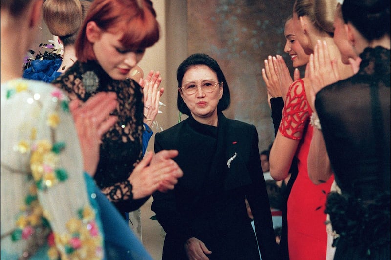 Mori is applauded by her models at the end of her autumn/winter 1998-99  haute couture show in Paris. AFP