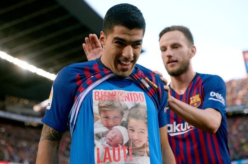 Barcelona's Uruguayan forward Luis Suarez celebrates a goal during the Spanish league football match between FC Barcelona and Real Madrid CF at the Camp Nou stadium in Barcelona. AFP