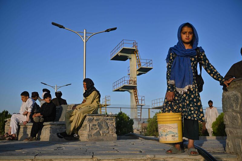 People at Wazir Akbar Khan Hill in Kabul. Whether Afghan girls receive an education under the Taliban is turning into an issue of wealth, young women living under the regime say. AFP