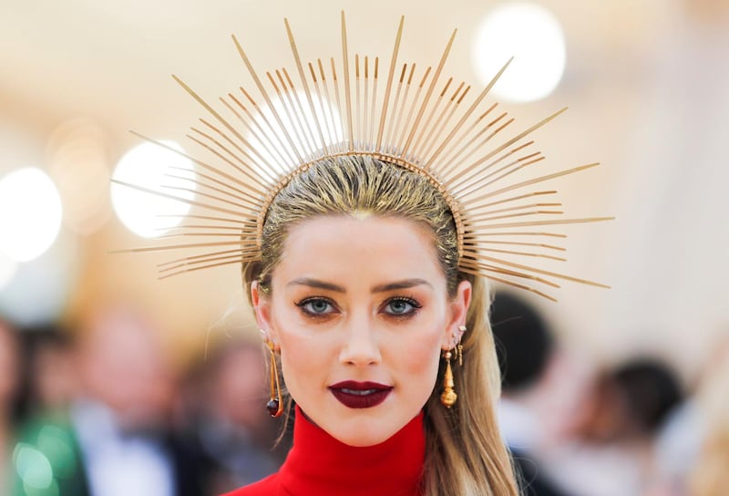 Actor Amber Heard arrives at the Met Gala to celebrate the opening of “Heavenly Bodies: Fashion and the Catholic Imagination” in New York. Carlo Allegri / Reuters