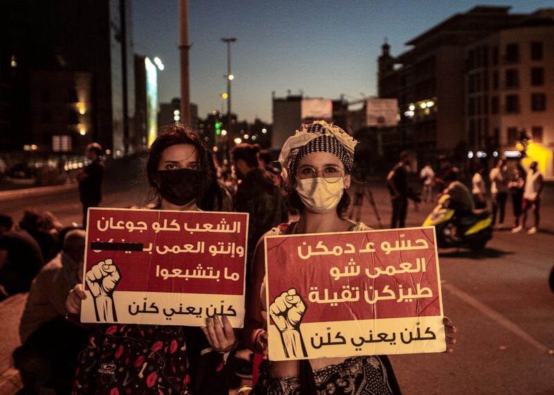 Anti-government protesters gather as they try to block tabarize highway during a protest against the economic condition, the collapsing Lebanese pound currency and increasing prices in Beirut. EPA