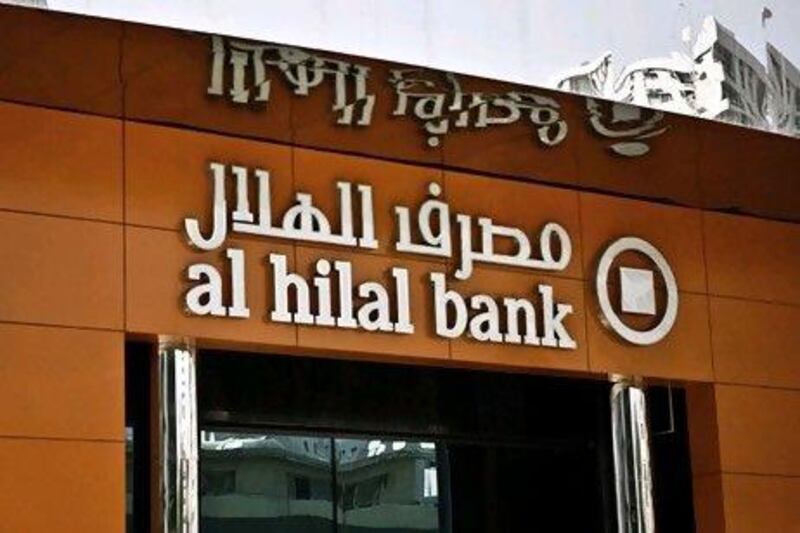 Al Hilal Bank has launched a system across its branches in the UAE which uses thumb scanners to identify customers for teller transactions. Alia Jeiroudi for The National