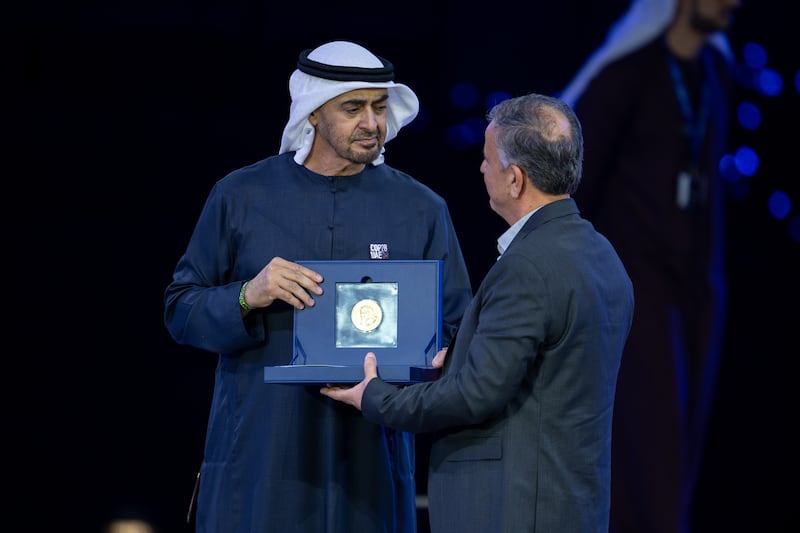 President Sheikh Mohamed presents the Zayed Sustainability Prize to a winner