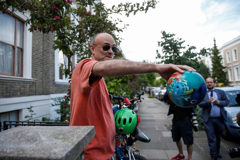 LONDON, ENGLAND - MAY 23: Boris Johnson's Chief Advisor, Dominic Cummings reminds photographers to maintain social distancing as he leaves his home on May 23, 2020 in London, England. On March 31st 2020 Downing Street confirmed to journalists that Dominic Cummings was self-isolating with COVID-19 symptoms at his home in North London. Durham police have confirmed that he was actually hundreds of miles away at his parent's house in the city. (Photo by Hollie Adams/Getty Images)