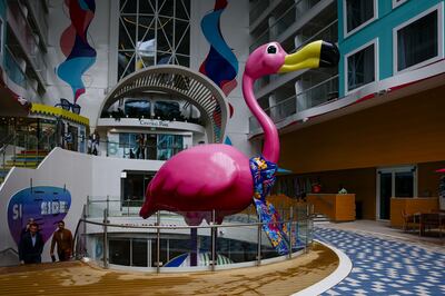 A flamingo installation looms large over the family-friendly Surfside neighborhood on the Icon of the Seas cruise ship. Getty Images